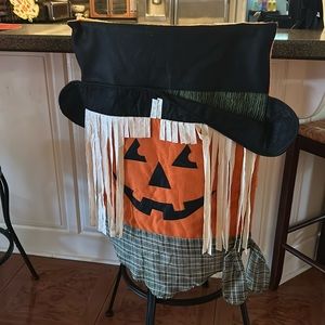 4 Halloween chair covers. Super cute! 🎃